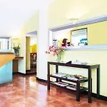 Dharma Boutique & فندق